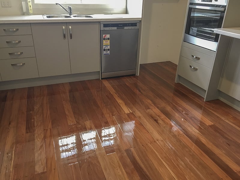 Polished wooden floor in the kitchen