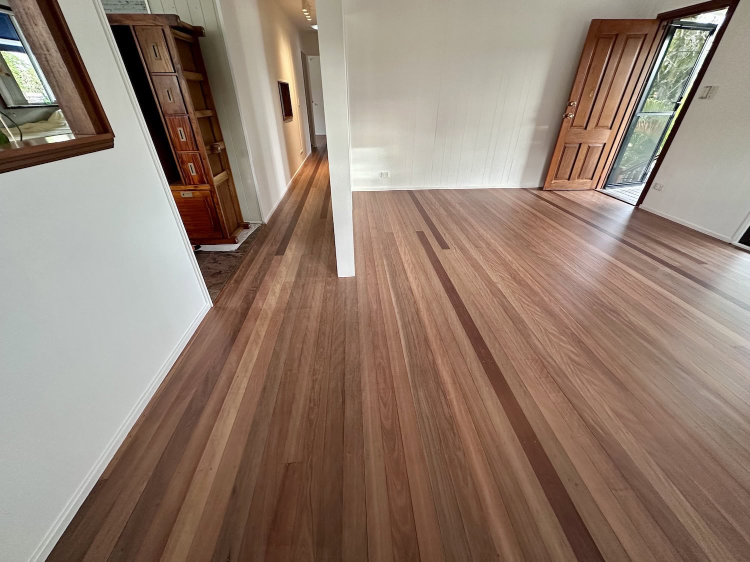 Wooden flooring installation in a modern home interior — example finish for Auchenflower timber floors