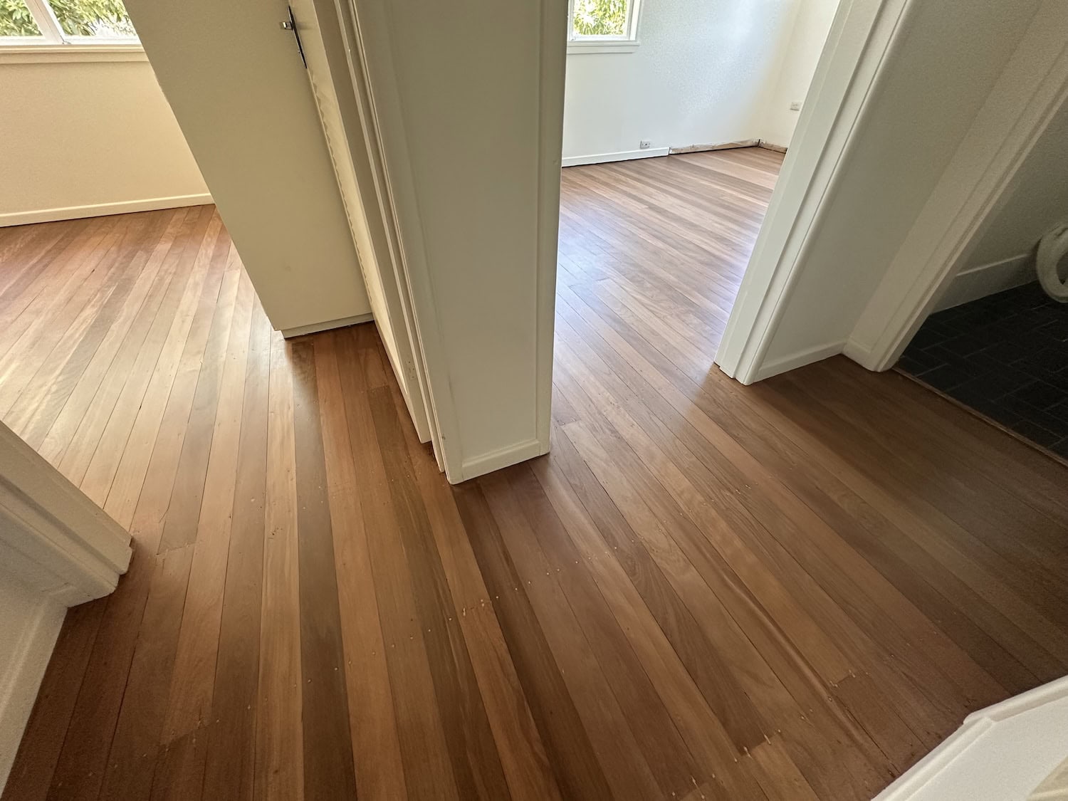 Wooden flooring with a warm finish in a modern home interior — Bardon floor sanding job
