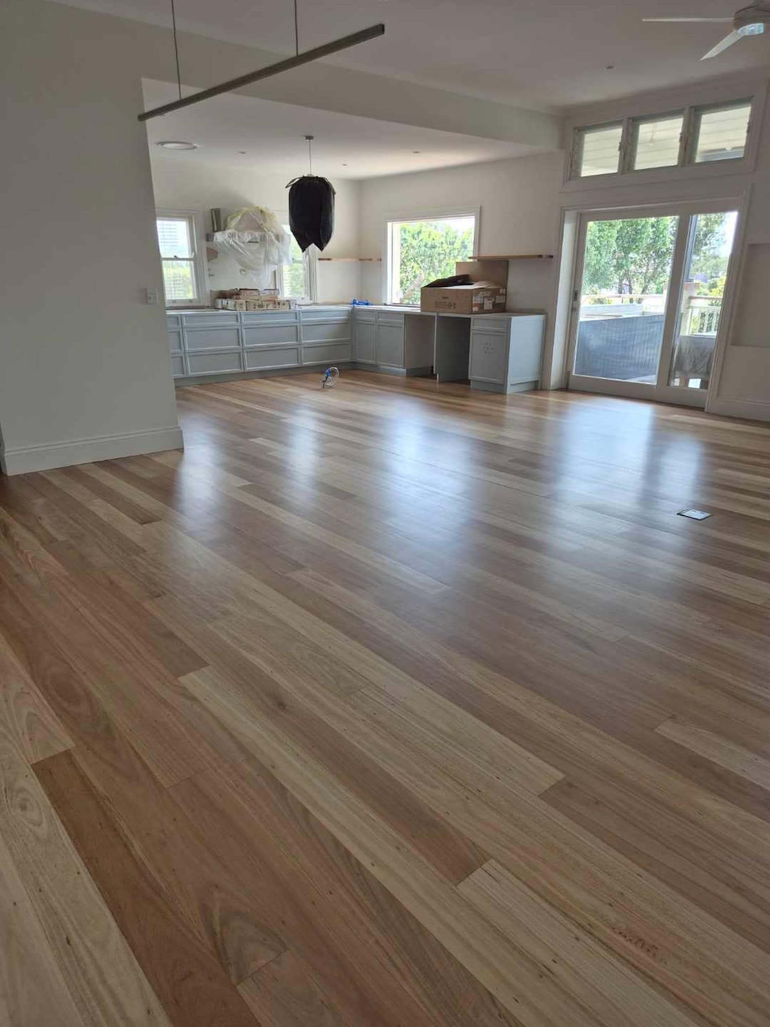 Modern hardwood flooring in a bright spacious living area — Bulimba floor sanding job