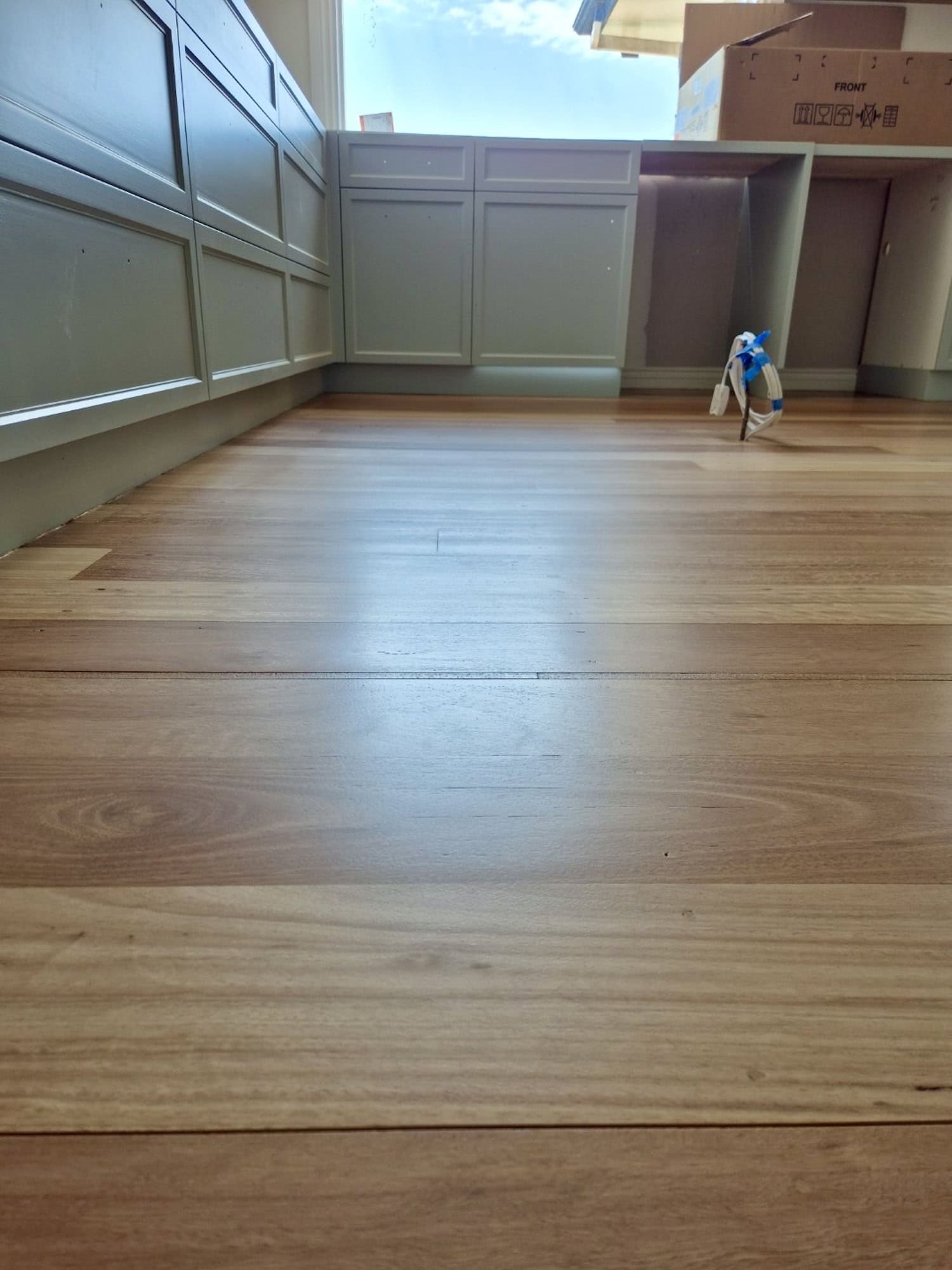 Wooden flooring with warm matte finish in a modern Brisbane home — Sunnybank Hills floor sanding job